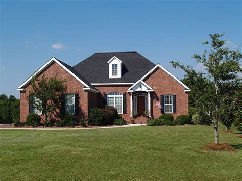 what color metal roof goes with red brick house|black shingles on brick house.